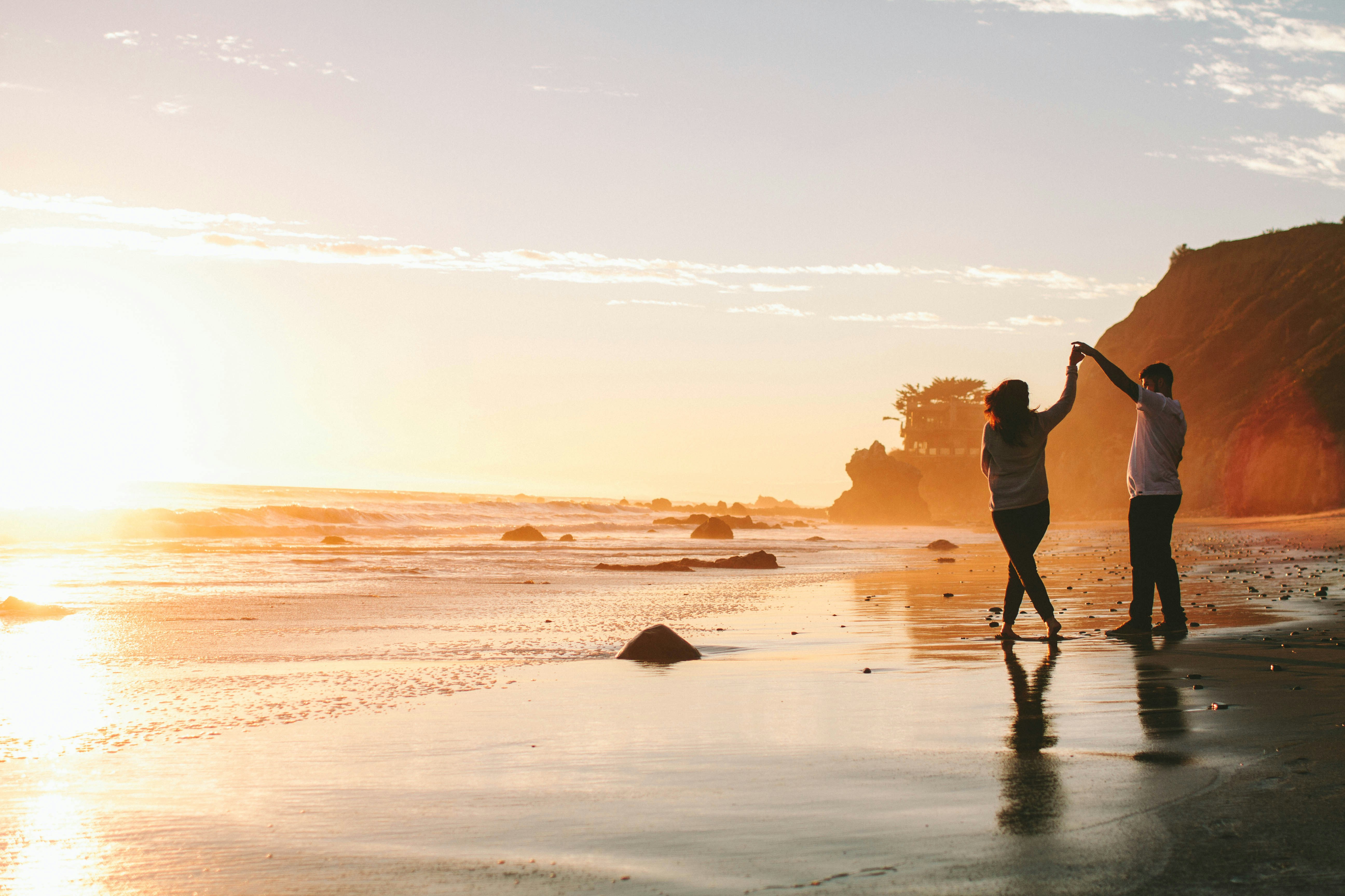 Couple on the beach at sunset